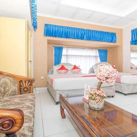 Oyo 3134 Puri Tamu Hotel Джимбаран Экстерьер фото