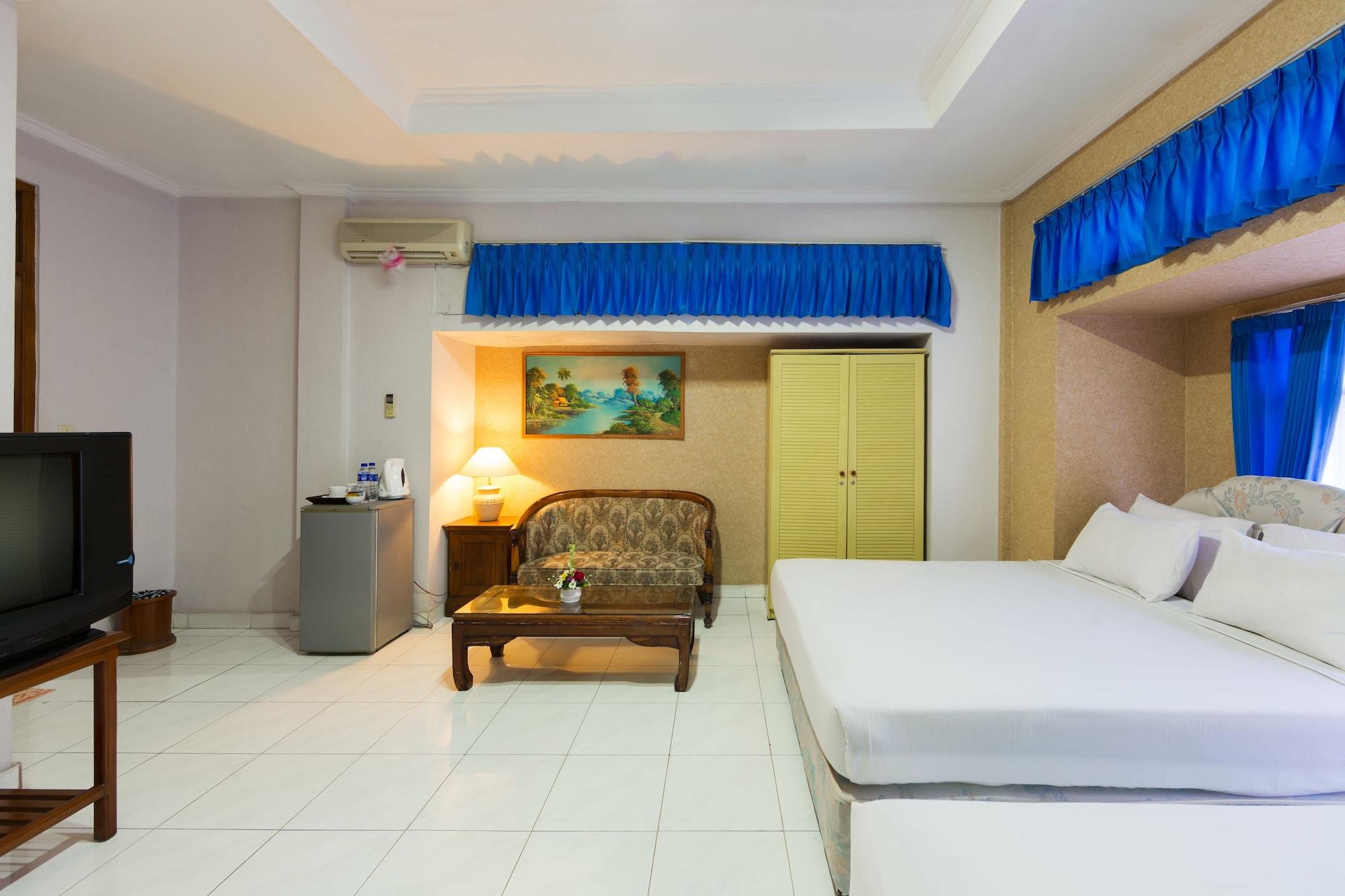 Oyo 3134 Puri Tamu Hotel Джимбаран Экстерьер фото