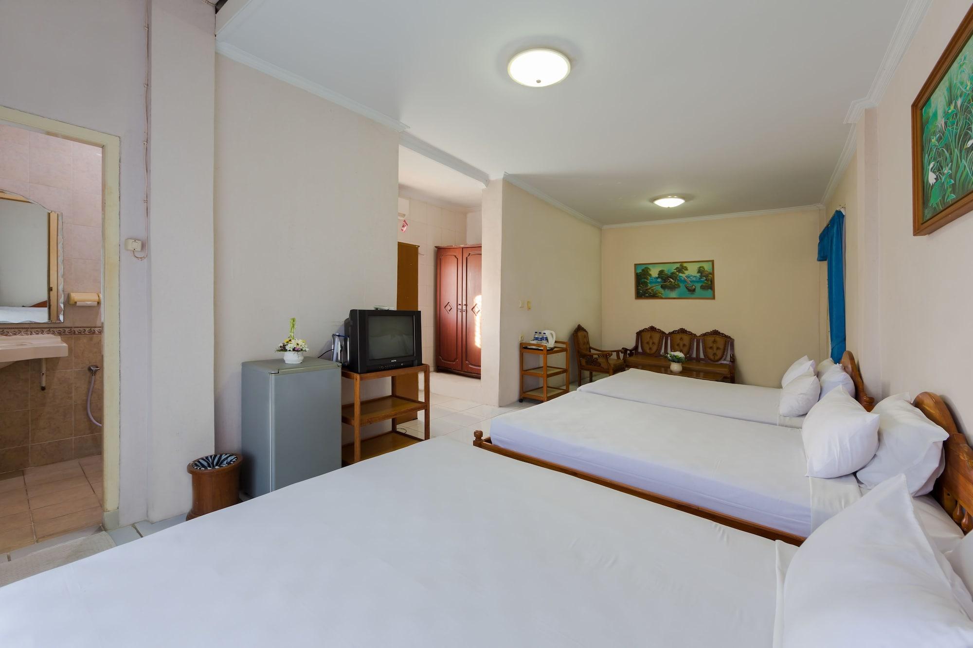 Oyo 3134 Puri Tamu Hotel Джимбаран Экстерьер фото