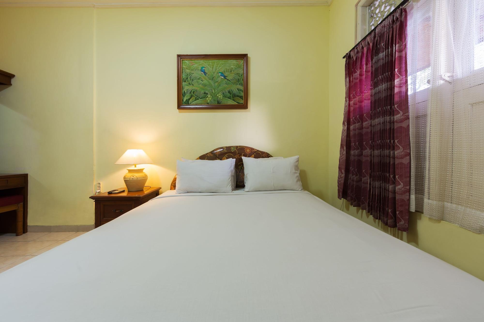 Oyo 3134 Puri Tamu Hotel Джимбаран Экстерьер фото