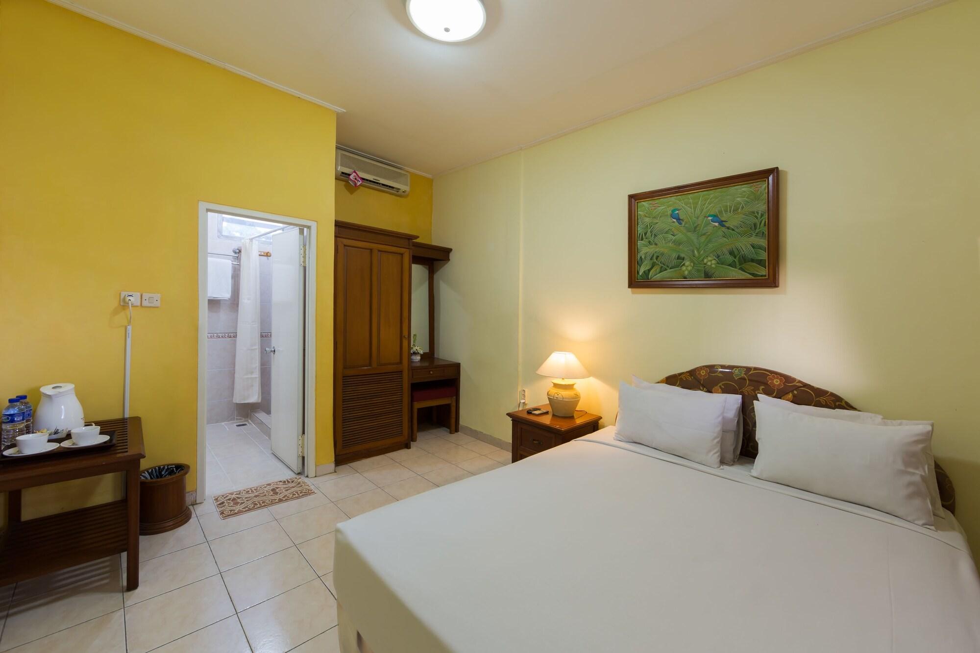 Oyo 3134 Puri Tamu Hotel Джимбаран Экстерьер фото