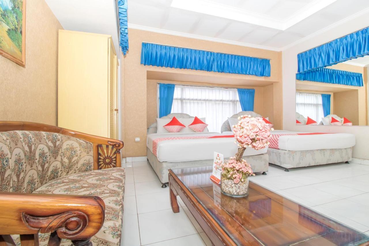 Oyo 3134 Puri Tamu Hotel Джимбаран Экстерьер фото
