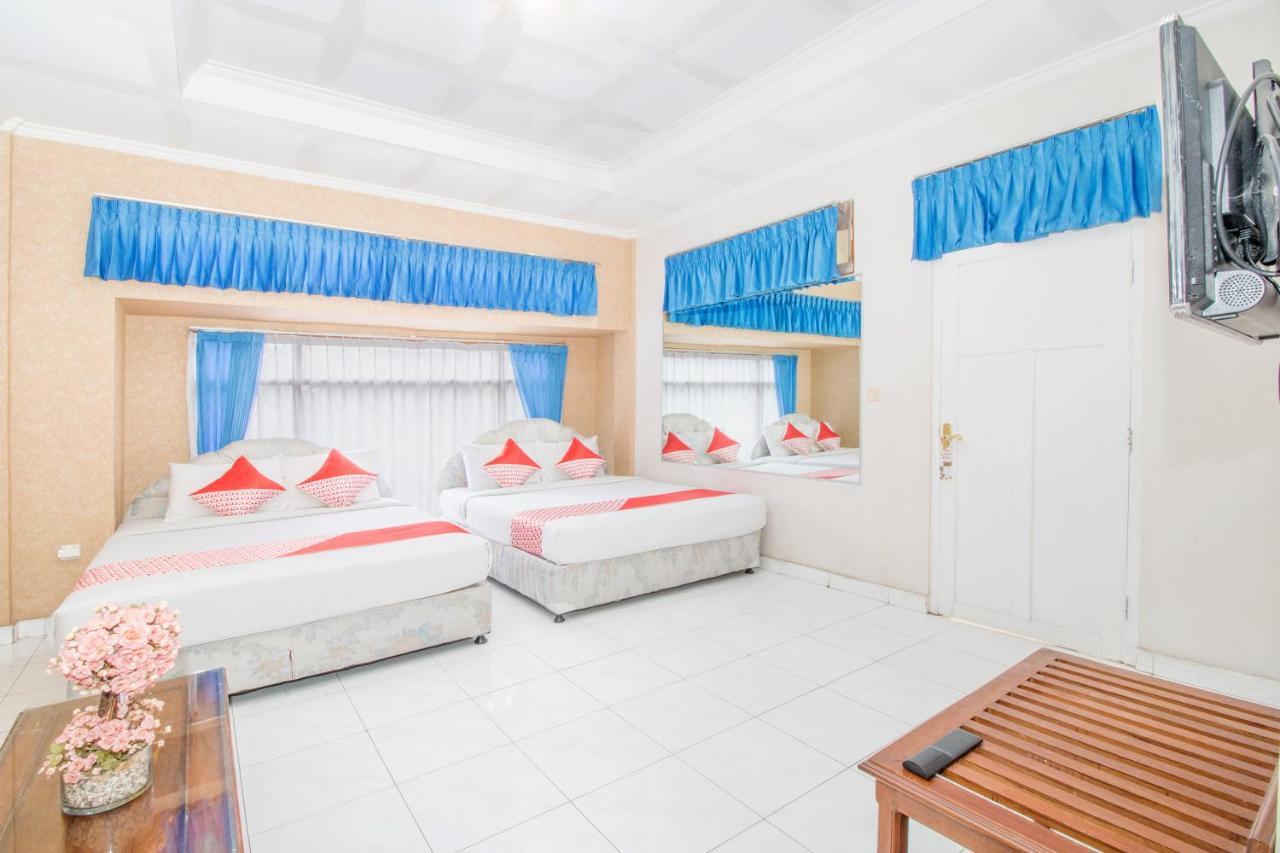 Oyo 3134 Puri Tamu Hotel Джимбаран Экстерьер фото