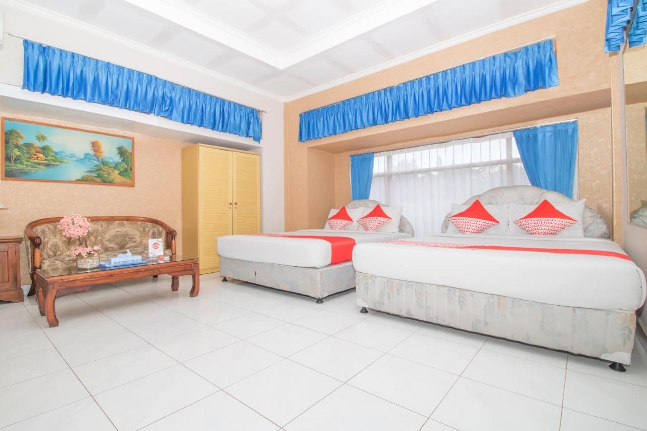 Oyo 3134 Puri Tamu Hotel Джимбаран Экстерьер фото